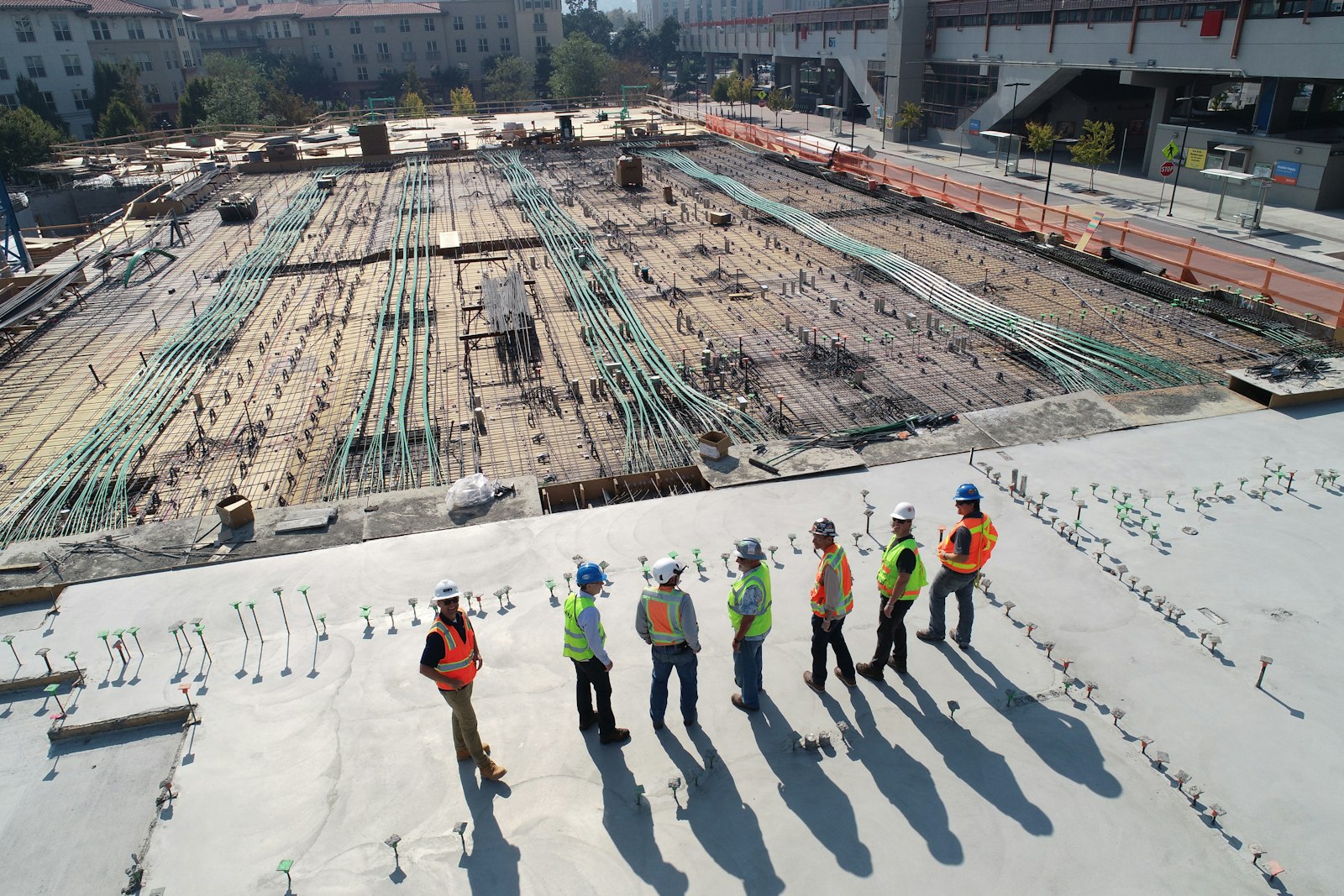 Commercial concrete slab preparation on an active job site